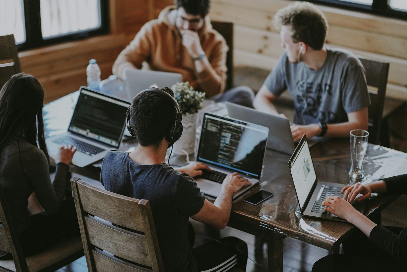 A product team working together at a shared table